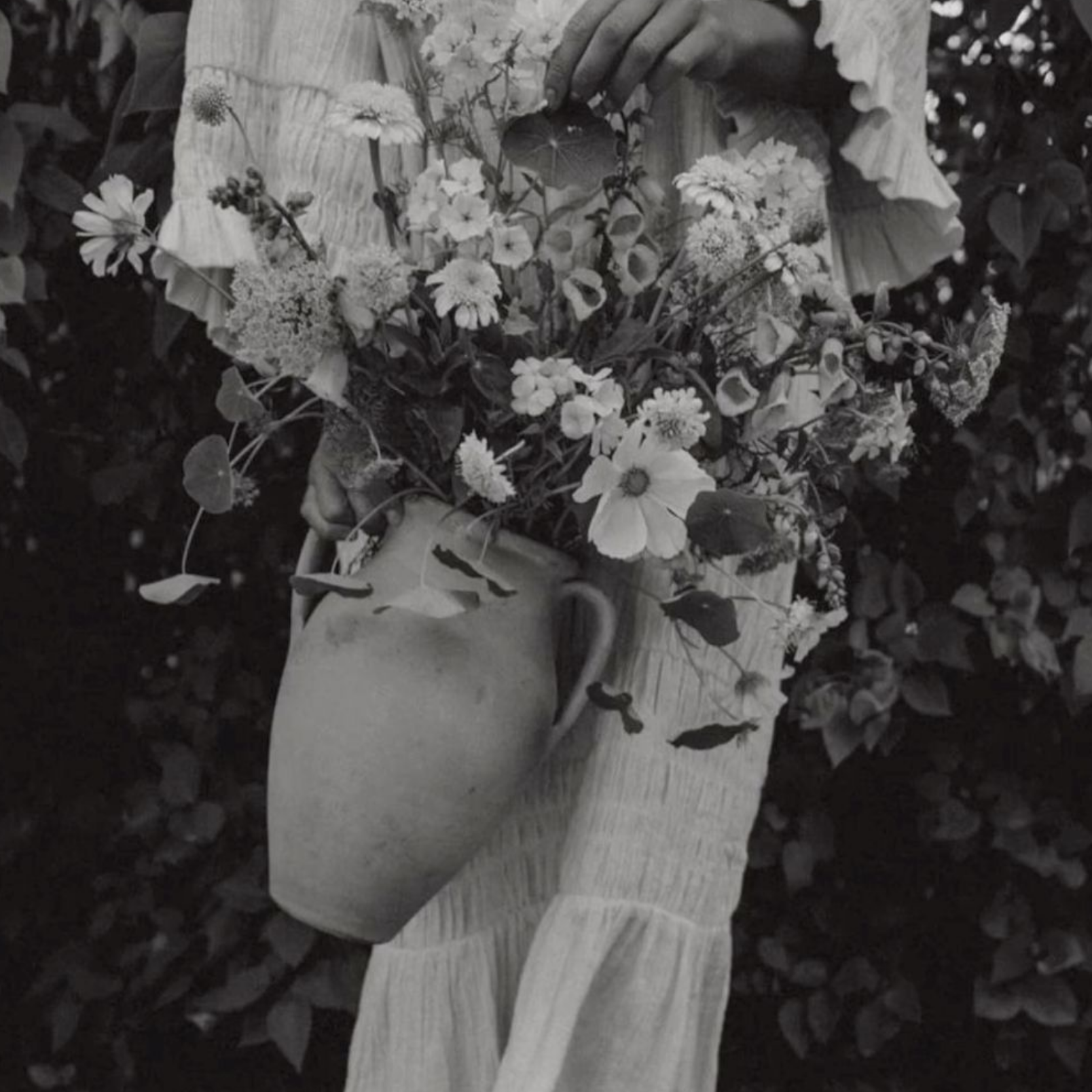 black and white photo woman and flowers