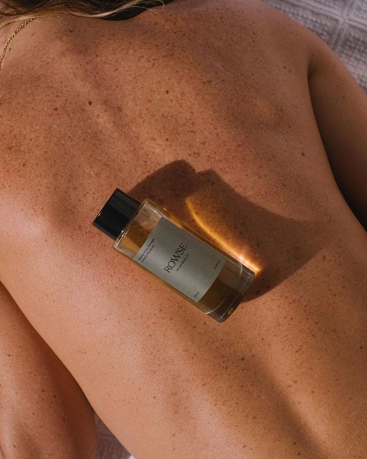 perfume on girl's back